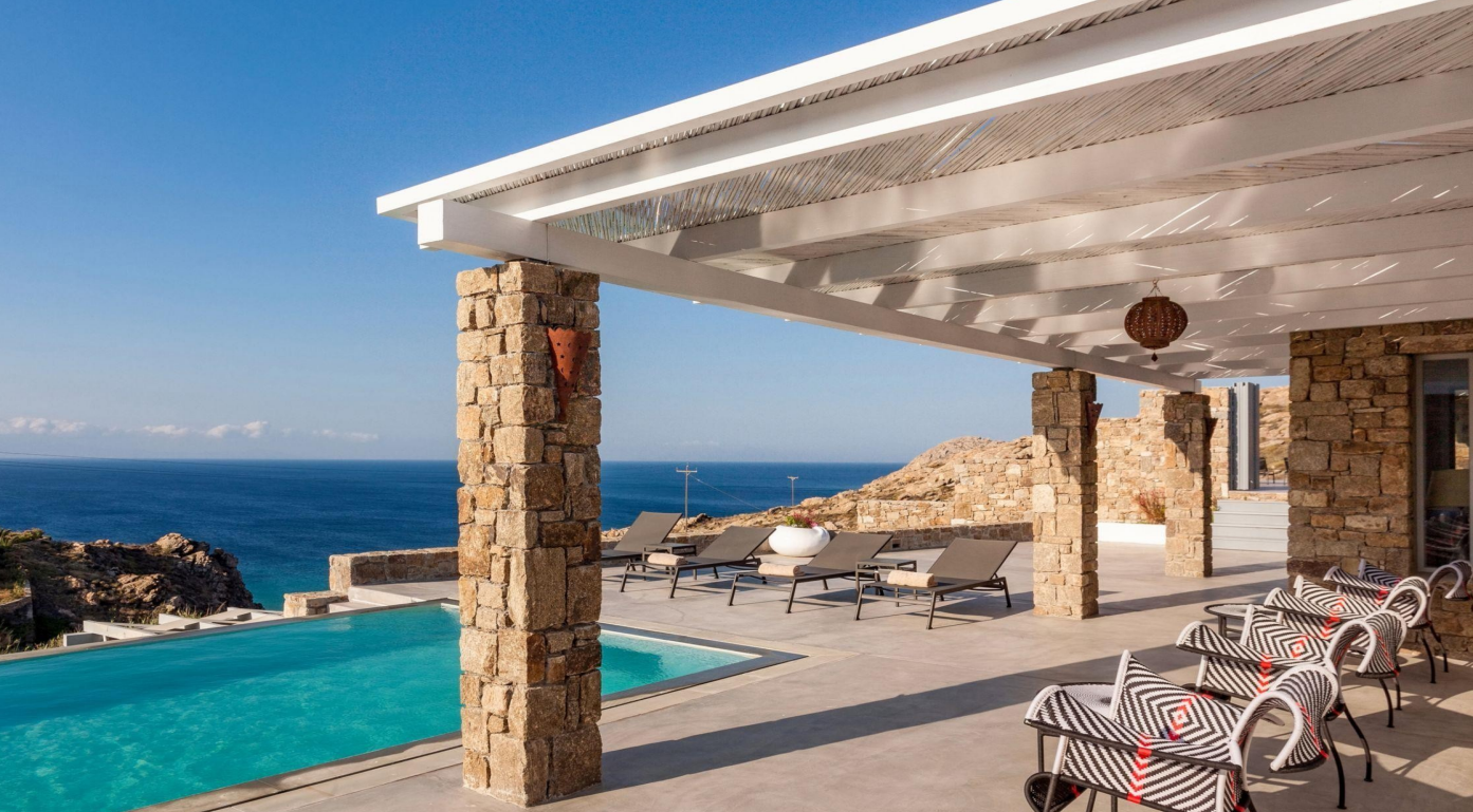luxury-poolside-terrace-ocean-view-stone-columns