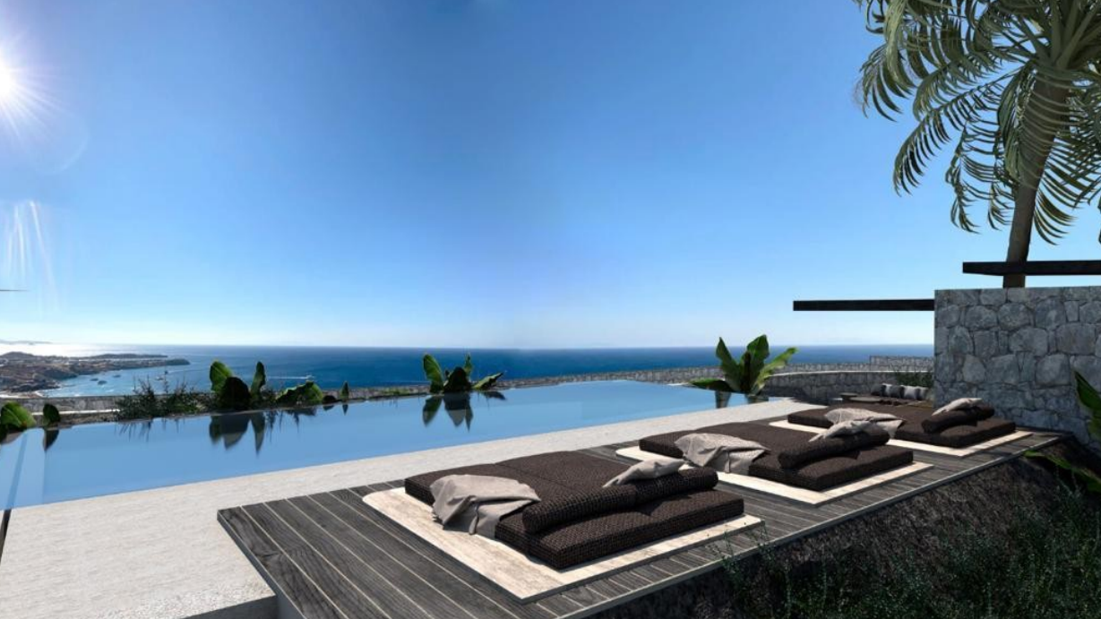 luxury-poolside-sun-loungers-ocean-view