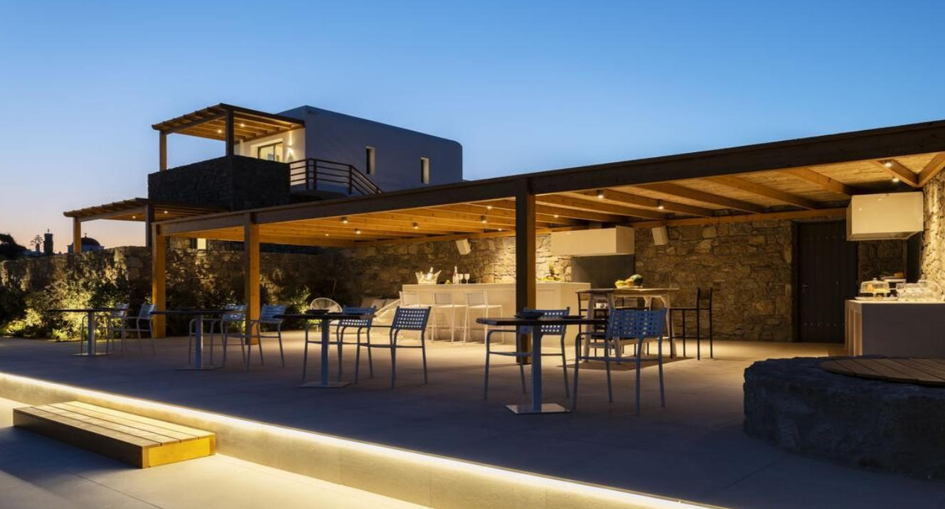 luxury-villa-outdoor-kitchen-bar-and-seating-night-view-ibiza
