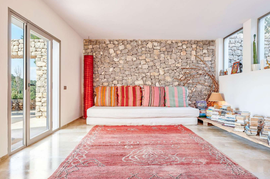 modern-living-room-ibiza-villa-stone-wall-rug