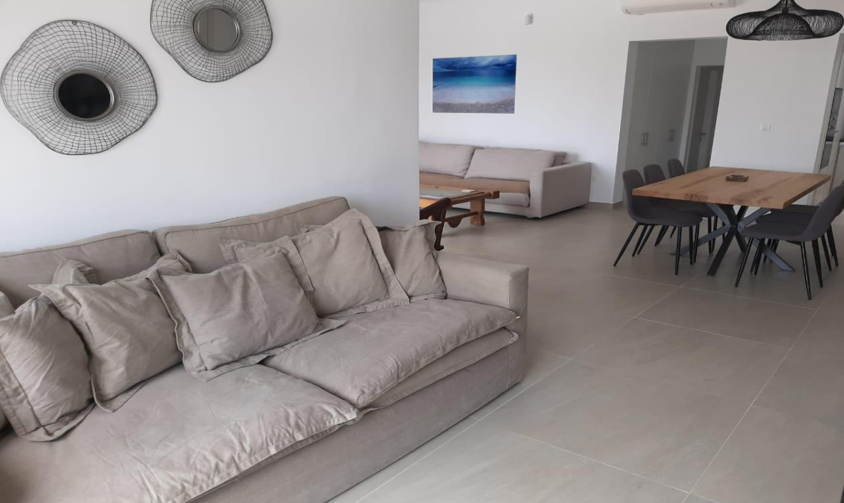 luxury-villa-living-room-with-sofa-and-dining-area-ibiza